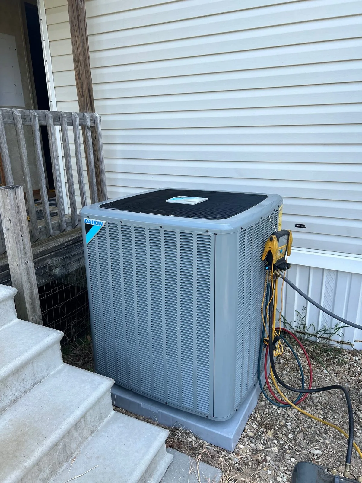 Daikin condenser by back steps